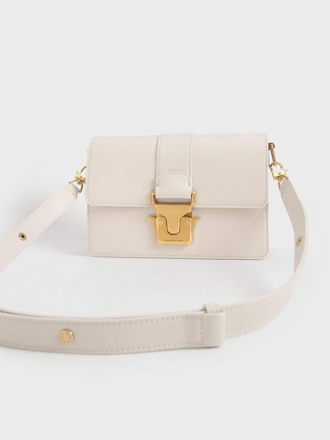 Ivory Metallic Accent Shoulder Bag - CHARLES & KEITH ID