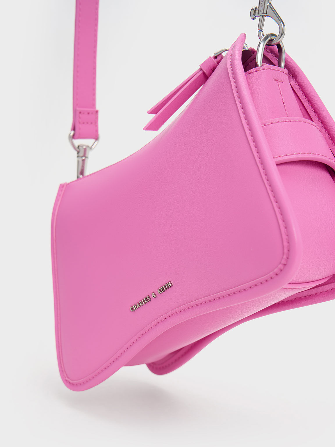 Charles and keith pink sling bag online