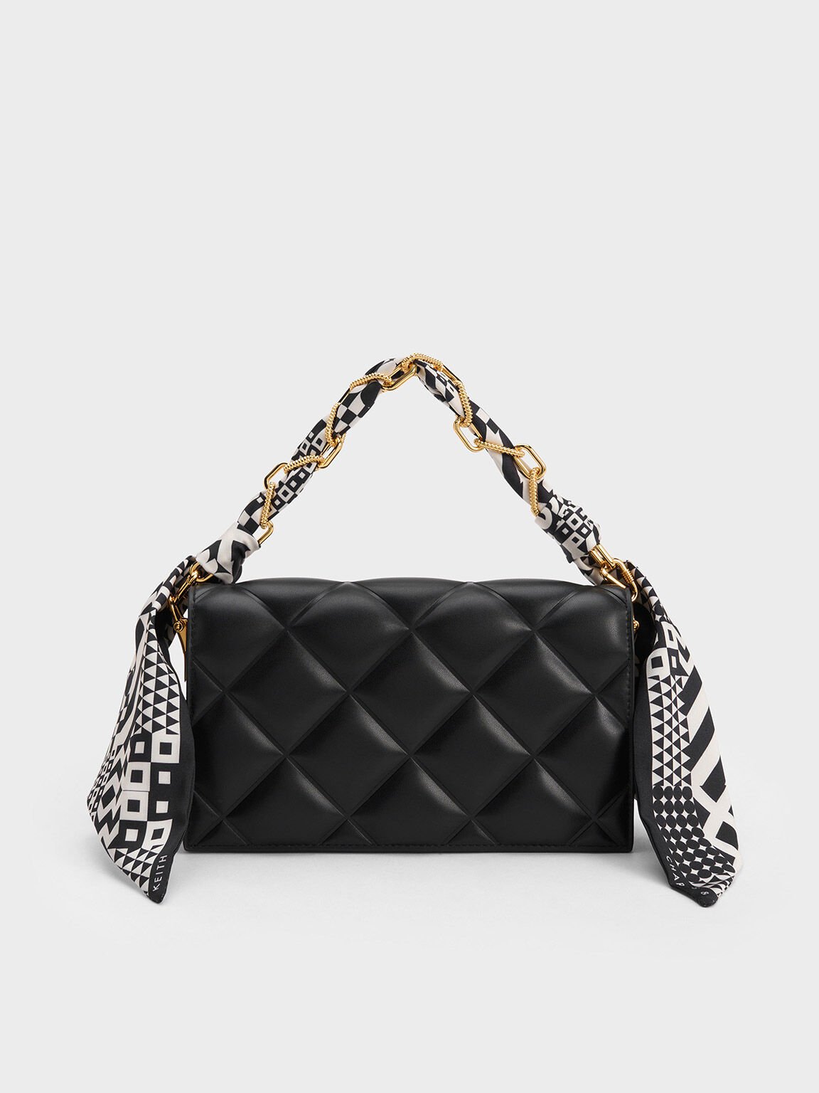 Black and 2025 white clutch