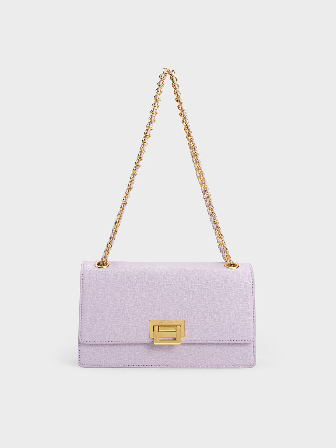 Charles and keith metallic top accent push lock bag