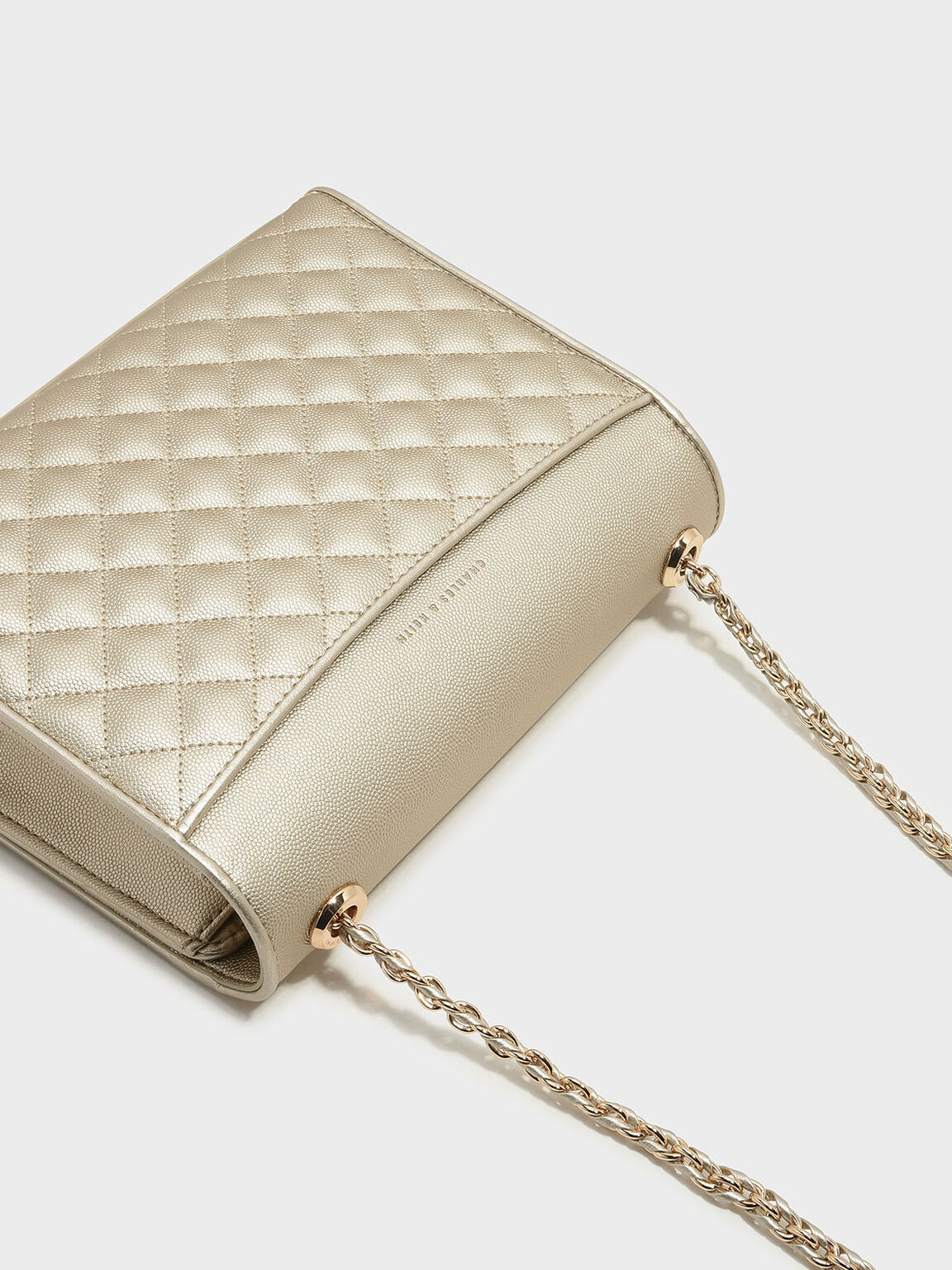 Gold Quilted Sling Bag CHARLES & KEITH ID