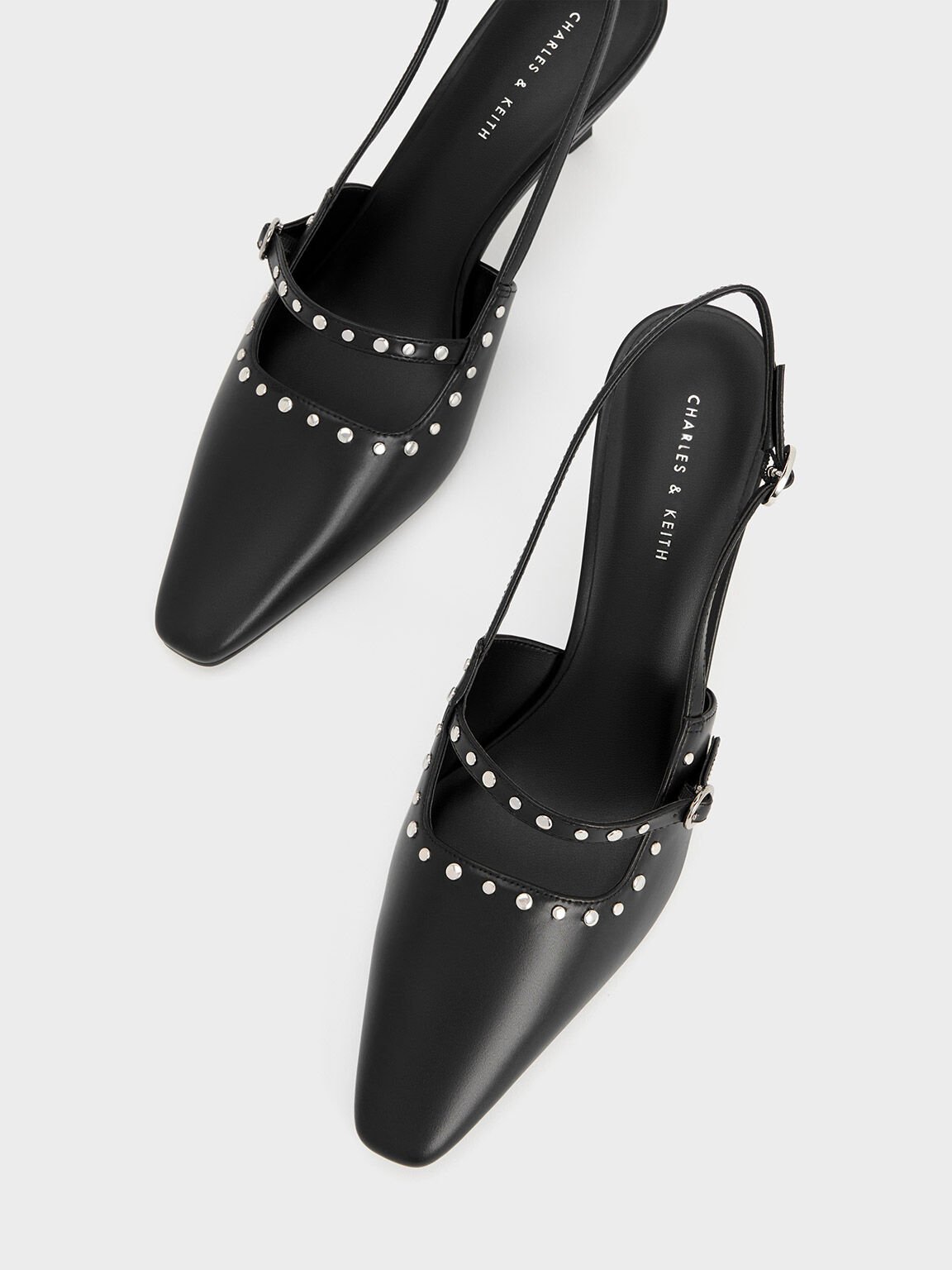 Black studded 2025 pumps