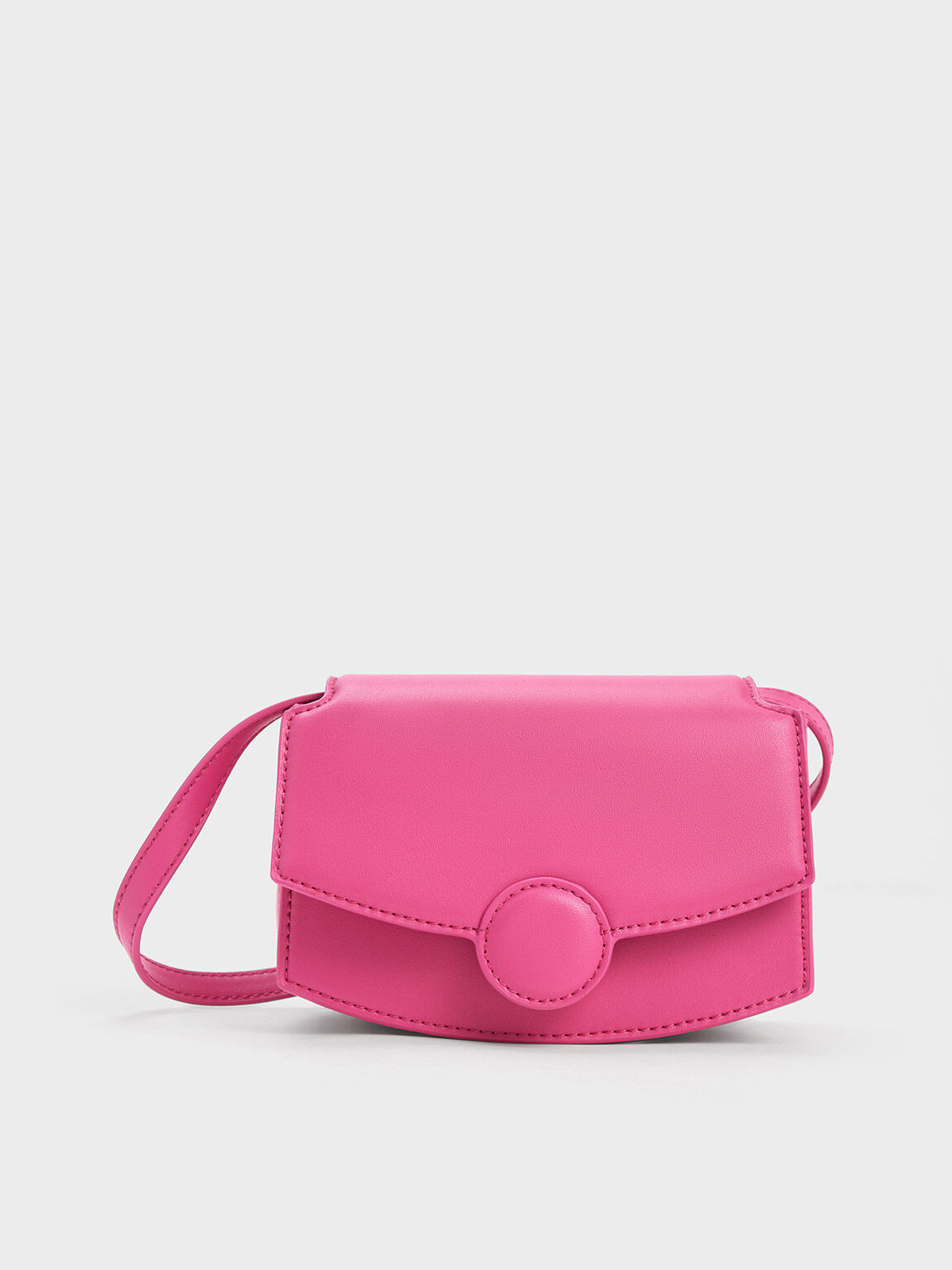 Circular buckle crossbody bag top