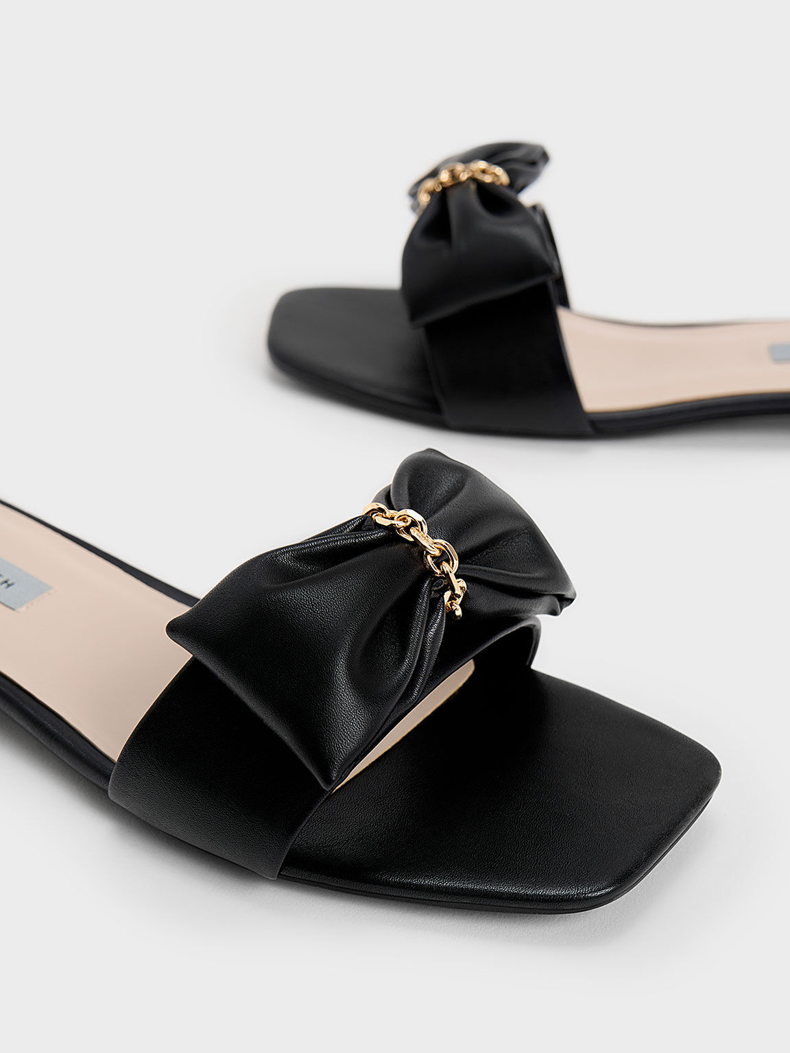 Black store bow slides