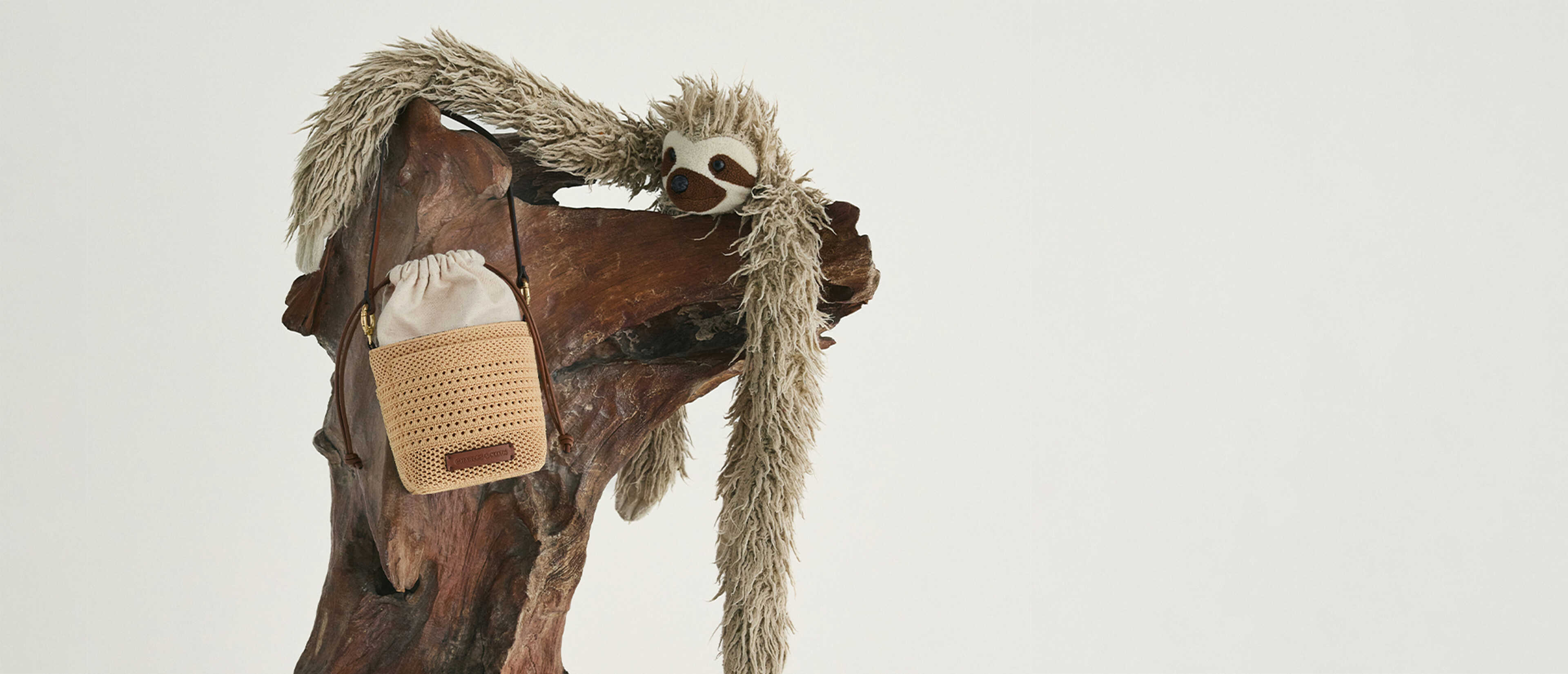 Girls’ Ida knitted bucket bag in beige - CHARLES & KEITH