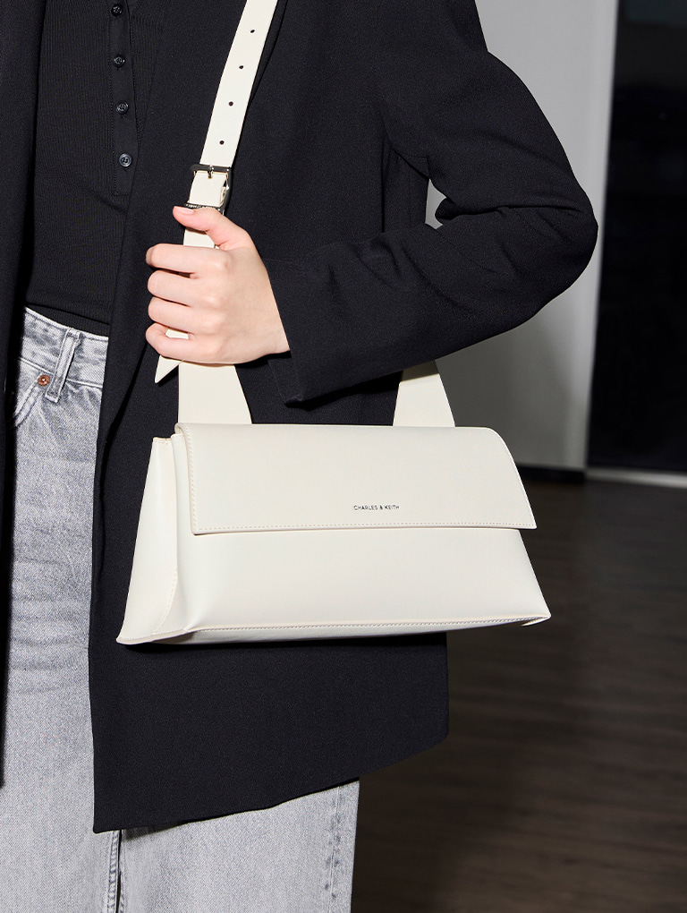 Women’s Marceline trapeze shoulder bag in cream  - CHARLES & KEITH