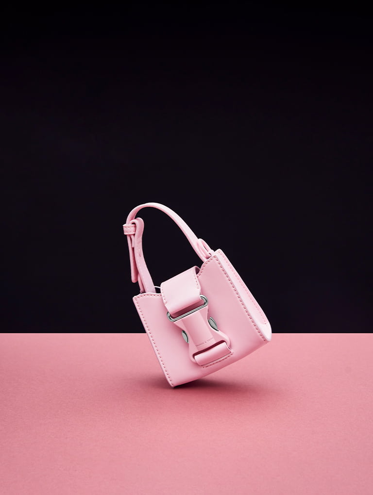 Women’s Tas Ivy Top Handle Mini in pink (close up)   - CHARLES & KEITH