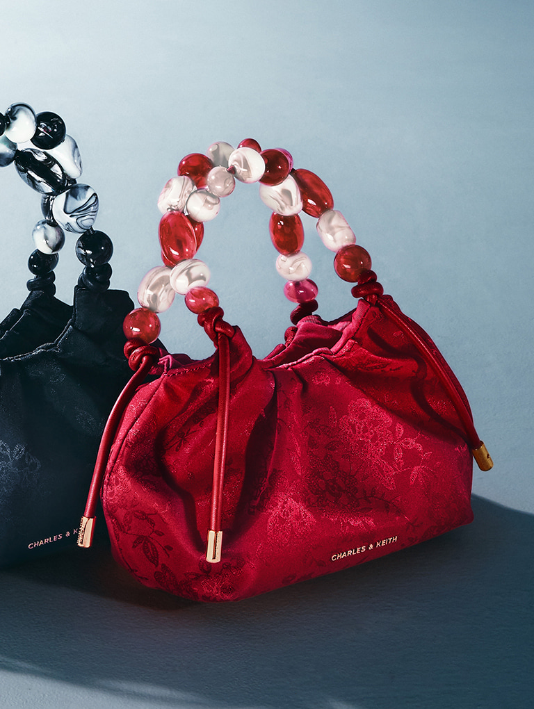 Women’s Aviary jacquard beaded-handle bag in black and crimson red - CHARLES & KEITH