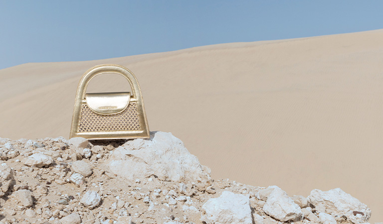 Este Metallic Crystal-Embellished Trapeze Bag - CHARLES & KEITH