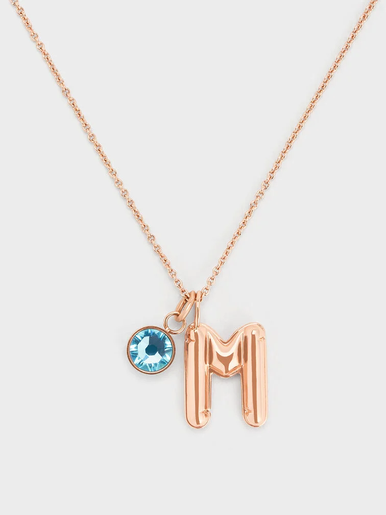 Personalised gifts like a rose gold alphabet charm on a necklace chain is a meaningful gift for moms this Christmas. 