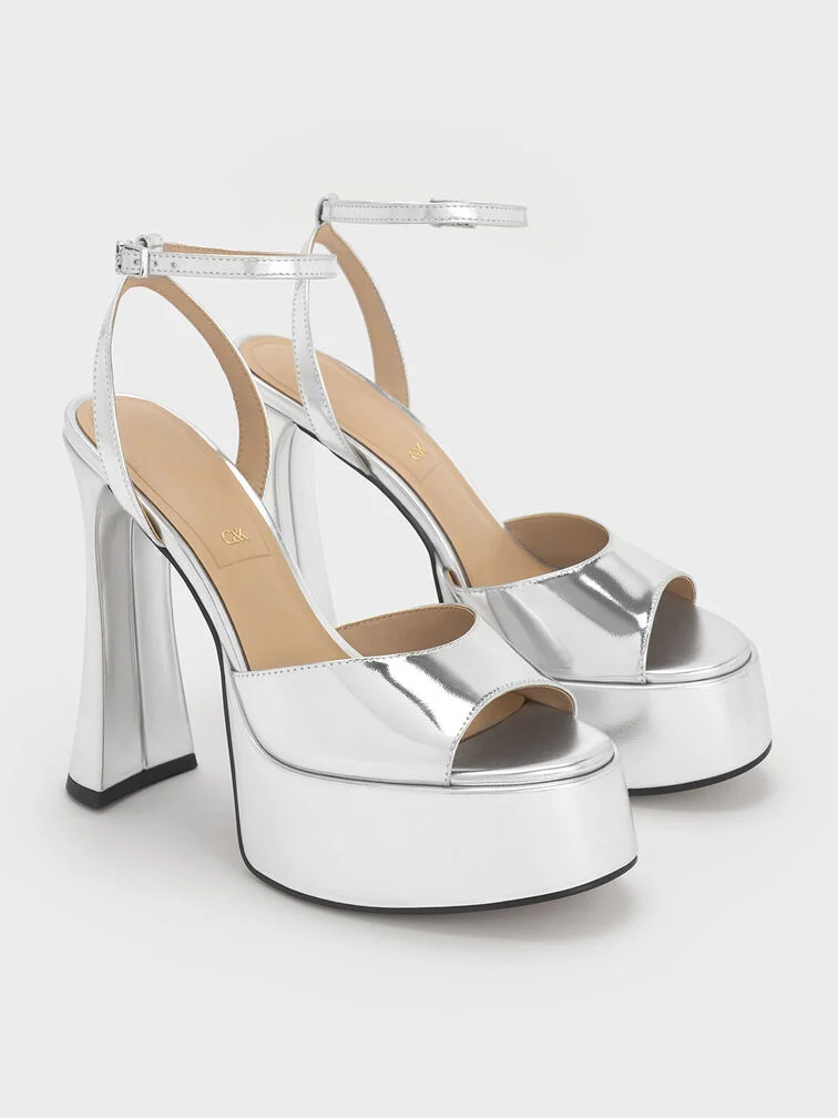 Ankle-strap platform sandals are a sturdy choice of footwear for ball gowns.