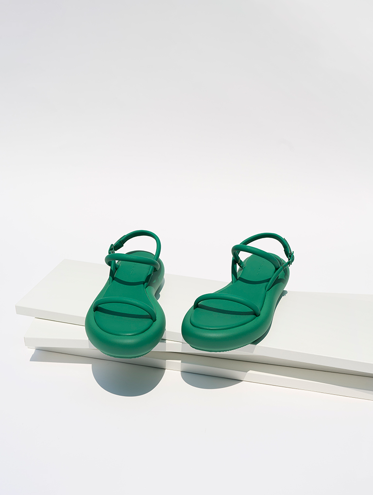Women’s Keiko Padded Flatform Sandals in green; Constance Flatform Sandals in white – CHARLES & KEITH