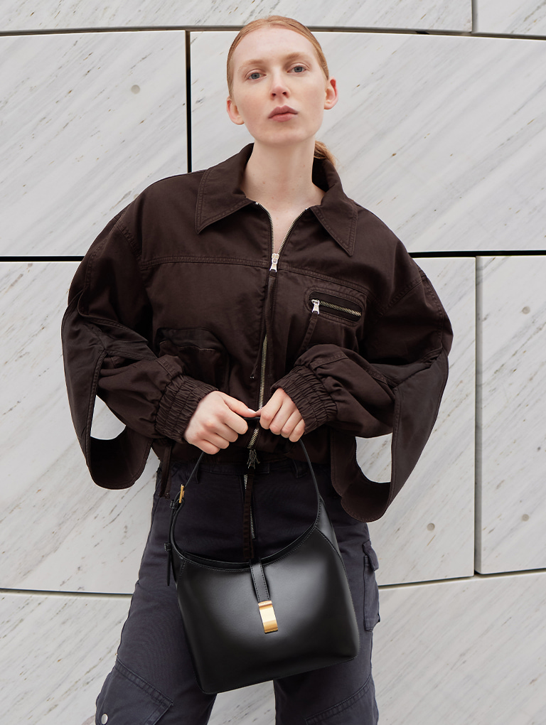 Women’s Wisteria belted shoulder bag in black - CHARLES & KEITH
