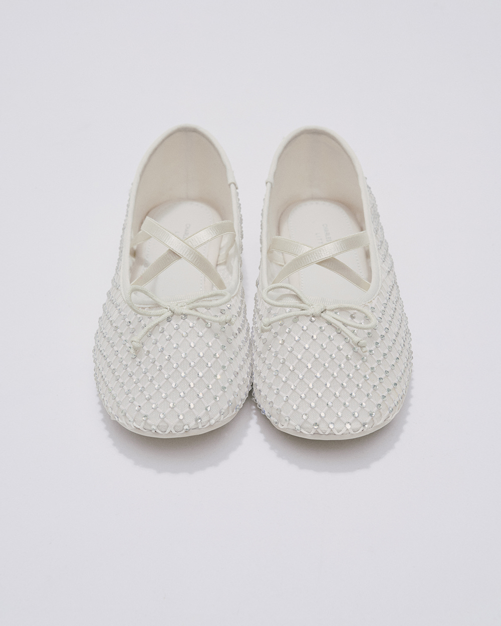  - CHARLES & KEITH