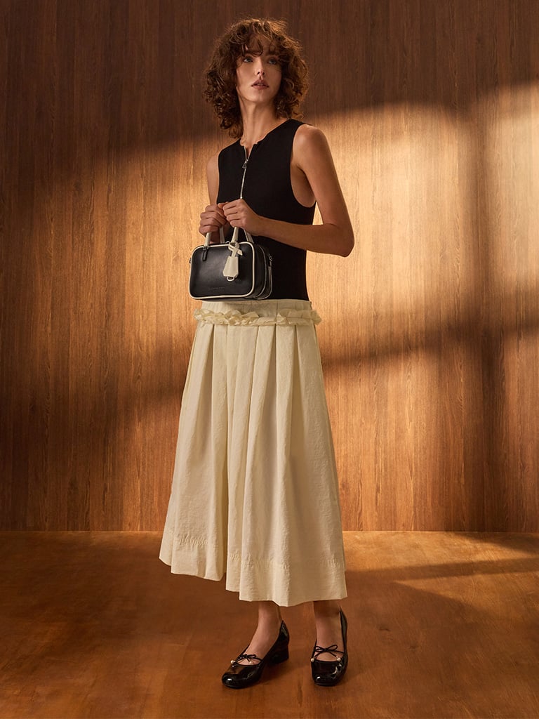 Mini Sianna Two-Tone Bowling Bag in black and white - CHARLES & KEITH