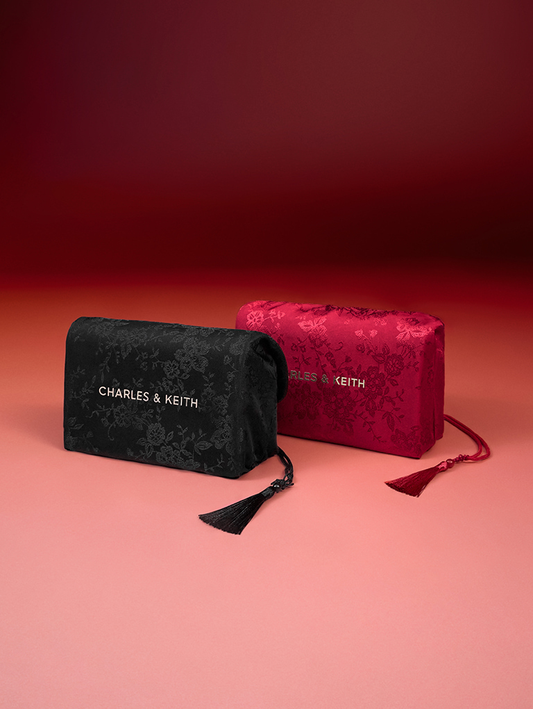 CHARLES & KEITH’s exclusive Lunar New Year dust bag in pink and black - CHARLES & KEITH