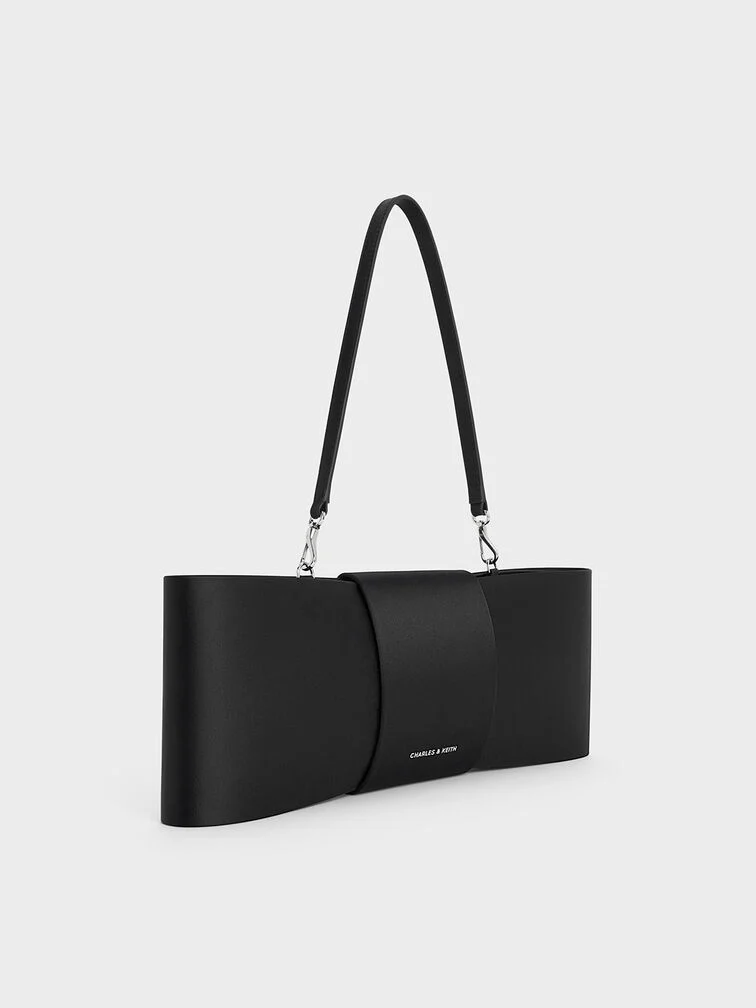 Women’s satin bow elongated shoulder bag in noir – CHARLES & KEITH 