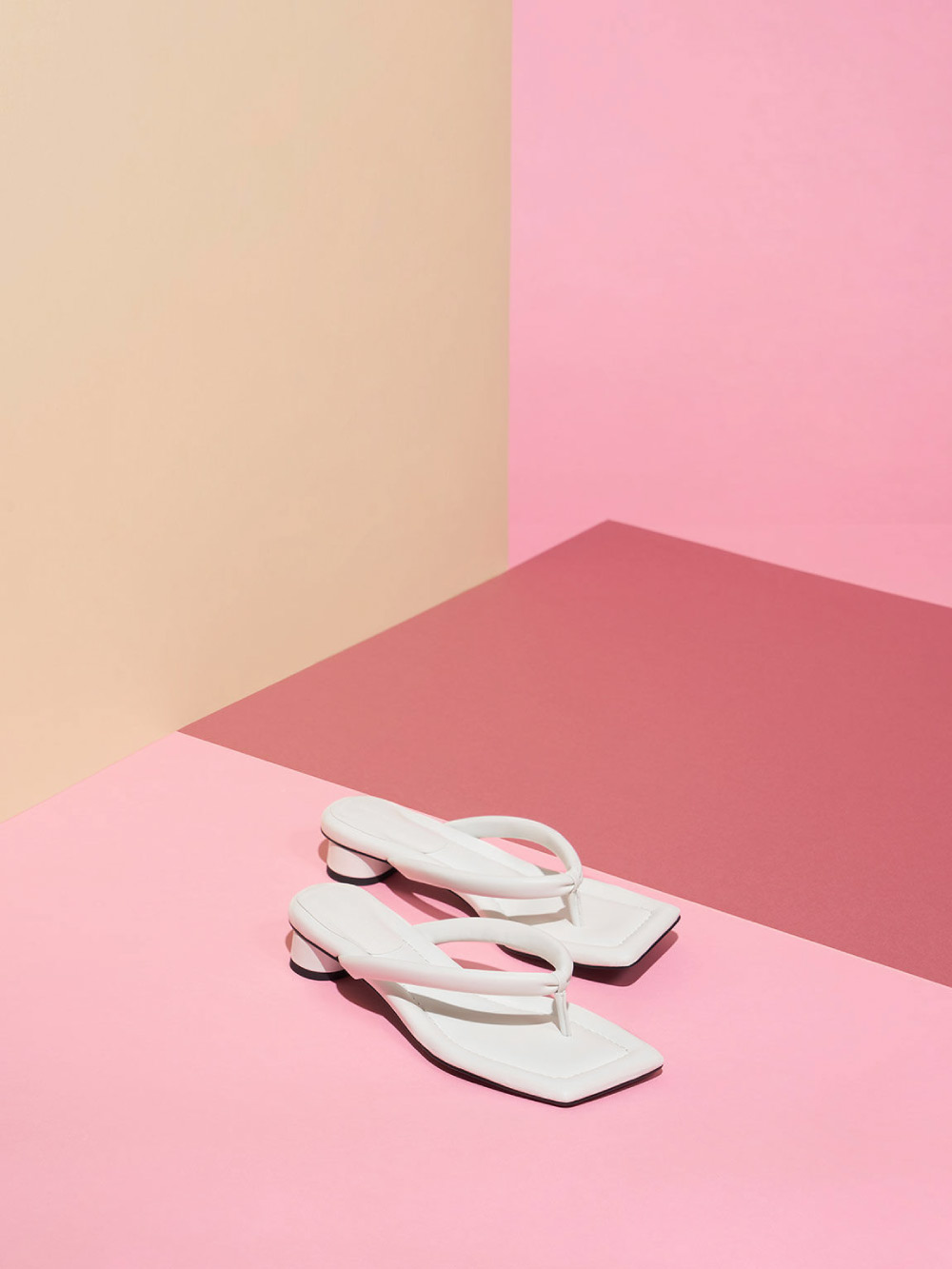Women's white asymmetric-toe puffy thong sandals -
                  CHARLES & KEITH
