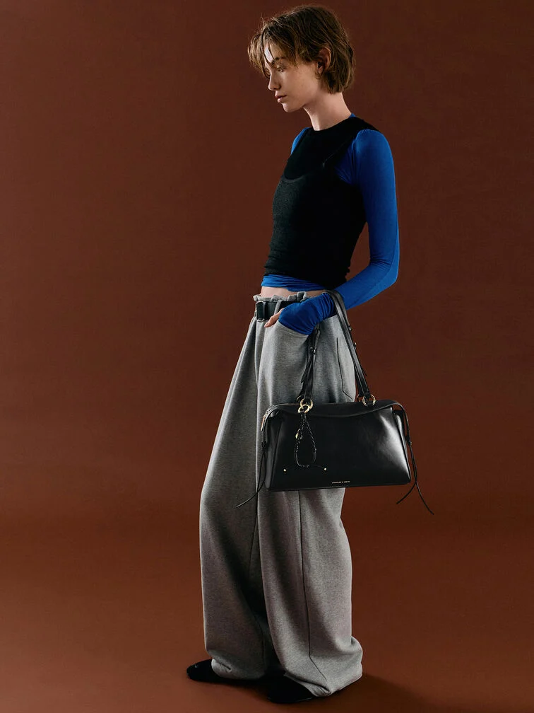 Wearing the right shoes with wide leg pants will serve to anchor your look and create an attractive silhouette.
