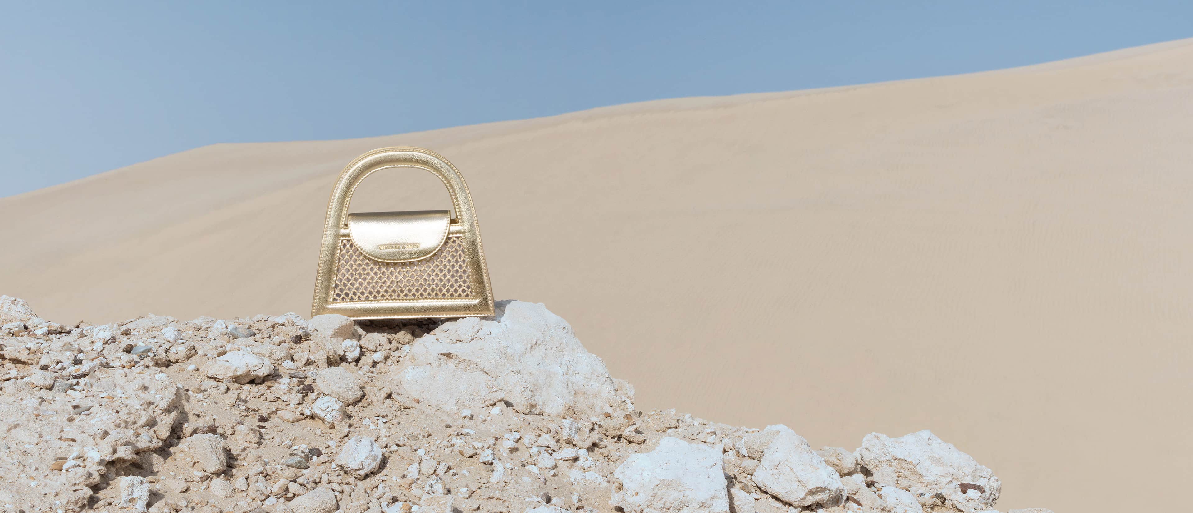 Este Metallic Crystal-Embellished Trapeze Bag - CHARLES & KEITH