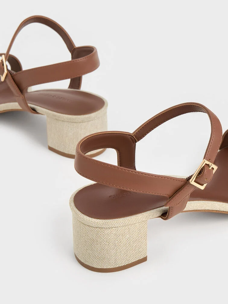 With its broad base, the effortlessly stylish block heel is a practical choice for everyday wear.  