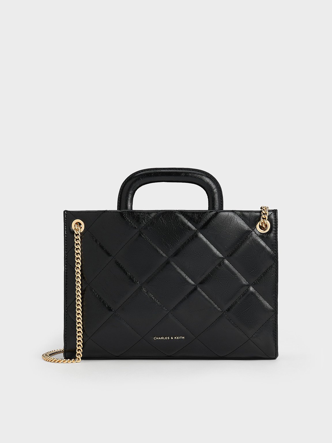 Charles and keith black quilted bag